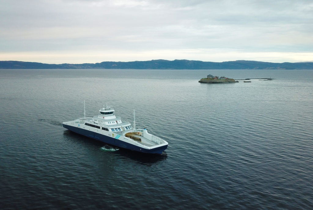 Hybrid ferry with Munkholmen in the background